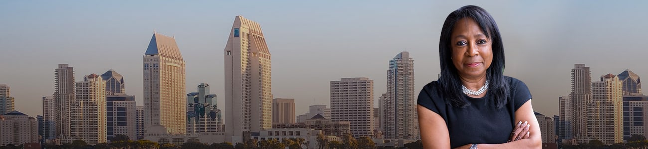 Hero Banner - Picture of Denise E. Oxley over a skyline of San Diego, CA